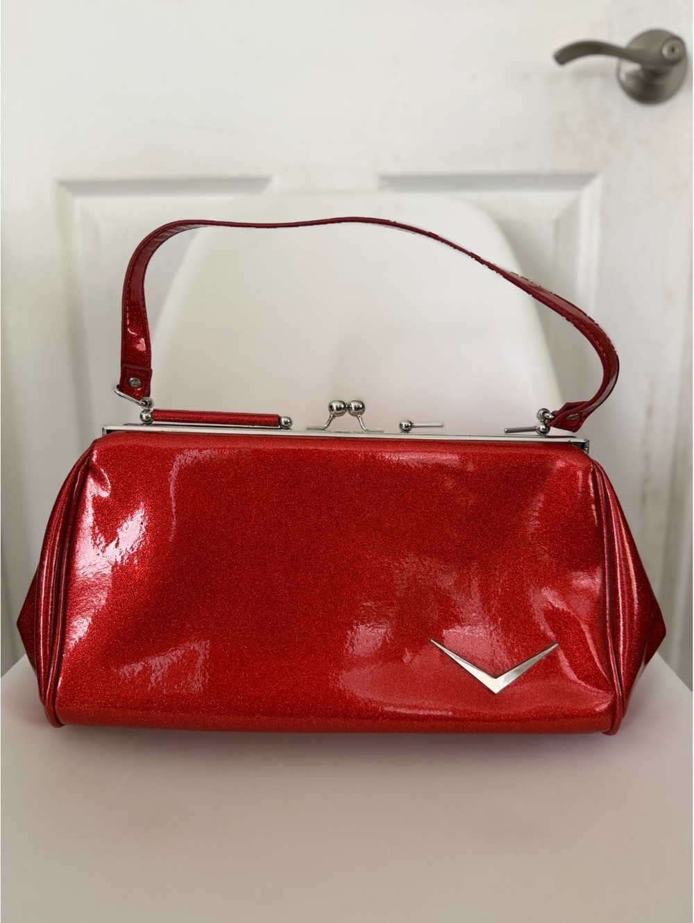 Lux De Ville red patent kiss lock handbag